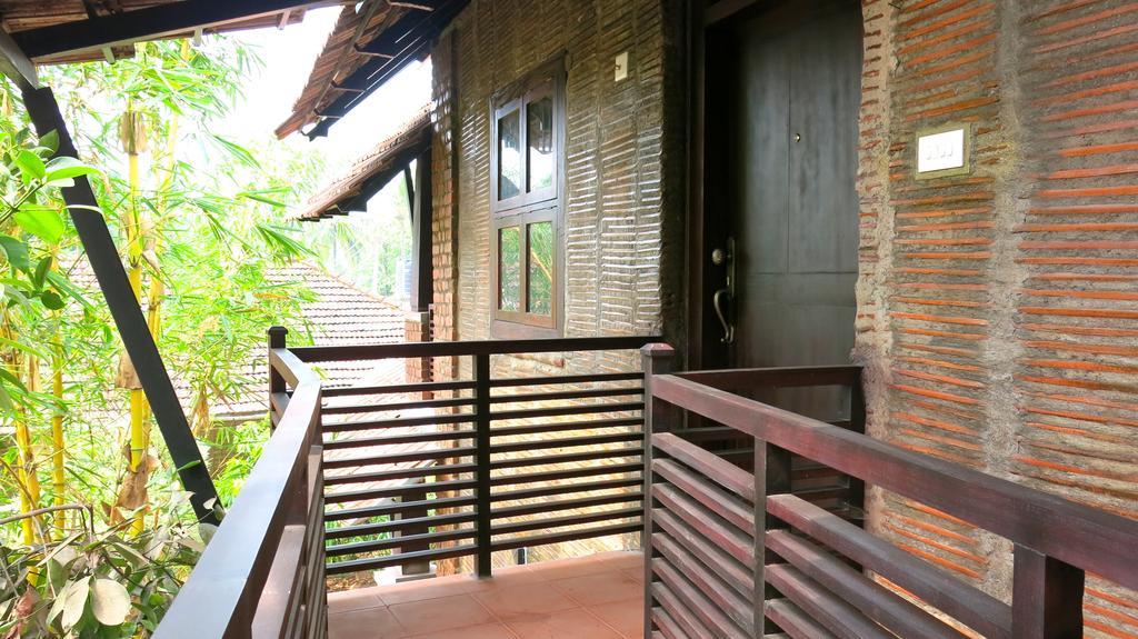 Clayfingers Art Cottage Thrissur Habitación foto